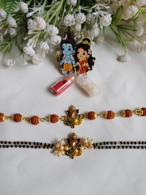 Divine Ganesha Bhai-Bhabhi Couple Rakhi Set